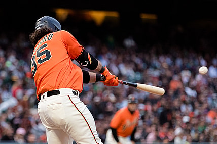 Jun 25, 2021; San Francisco, California, USA; San Francisco Giants shortstop Brandon Crawford (35) hits an RBI single against the Oakland Athletics in the fourth inning at Oracle Park. Mandatory Credit: John Hefti-USA TODAY Sports
