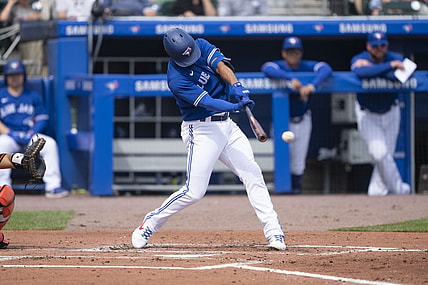 Jun 26, 2021; Buffalo, New York, CAN; Toronto Blue Jays second baseman Marcus Semien (10) hits a double during the third inning against the Baltimore Orioles at Sahlen Field. Mandatory Credit: Gregory Fisher-USA TODAY Sports