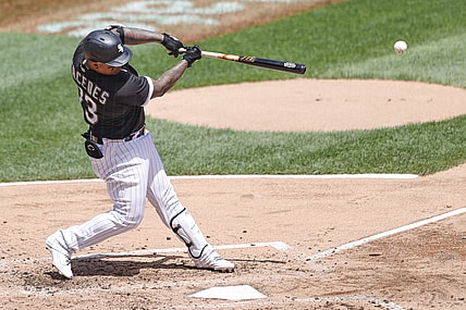 Jun 27, 2021; Chicago, Illinois, USA; Chicago White Sox catcher Yermin Mercedes (73) singles against the Seattle Mariners during the fifth inning of the first game of a doubleheader at Guaranteed Rate Field. Mandatory Credit: Kamil Krzaczynski-USA TODAY Sports