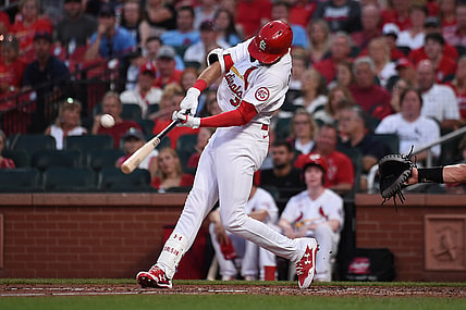 Jun 28, 2021; St. Louis, Missouri, USA; St. Louis Cardinals center fielder Dylan Carlson (3) hits an RBI triple against the Arizona Diamondbacks in the third inning at Busch Stadium. Mandatory Credit: Joe Puetz-USA TODAY Sports