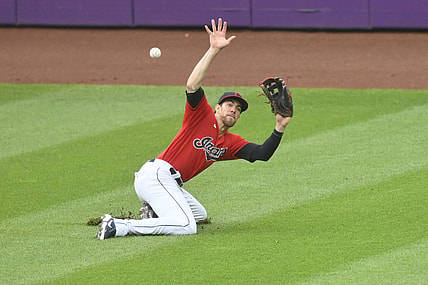 Jun 30, 2021; Cleveland, Ohio, USA; Cleveland Indians center fielder Bradley Zimmer (4) attempts to field a single hit by Detroit Tigers designated hitter Miguel Cabrera (not pictured) during the third inning at Progressive Field. Mandatory Credit: David Richard-USA TODAY Sports