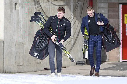 Mar 15, 2020; Calgary, AB, Canada; Calgary Hitmen forward Josh Prokop (10) and defensemen Luke Prokop (6) depart from the Scotiabank Saddledome. The Western Hockey League (WHL) season has been paused due to the COVID-19 coronavirus outbreak.  Mandatory Credit: Candice Ward-USA TODAY Sports
