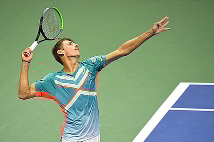 Sep 9, 2020; Flushing Meadows, New York,USA; Alex de Minaur of Australia serves against Dominic Thiem of Austria (not pictured) in a men's singles quarter-finals match on day nine of the 2020 U.S. Open tennis tournament at USTA Billie Jean King National Tennis Center. Mandatory Credit: Robert Deutsch-USA TODAY Sports