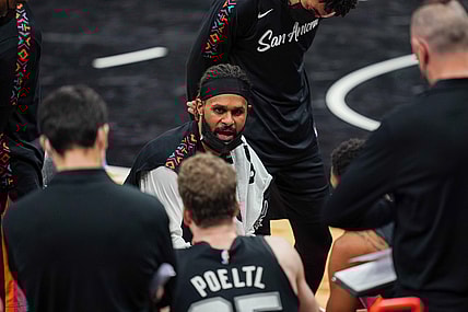 Jan 22, 2021; San Antonio, Texas, USA;  San Antonio Spurs guard Patty Mills (8) talks to his team during a timeout in the second half against the Dallas Mavericks at the AT&T Center. Mandatory Credit: Daniel Dunn-USA TODAY Sports