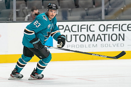 Mar 3, 2021; San Jose, California, USA;  San Jose Sharks defenseman Christian Jaros (83) watches the puck during the third period against the Colorado Avalanche at SAP Center at San Jose. Mandatory Credit: Stan Szeto-USA TODAY Sports