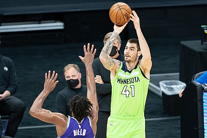 April 20, 2021; Sacramento, California, USA; Minnesota Timberwolves forward Juancho Hernangomez (41) shoots the basketball against Sacramento Kings guard Buddy Hield (24) during the first quarter at Golden 1 Center. Mandatory Credit: Kyle Terada-USA TODAY Sports