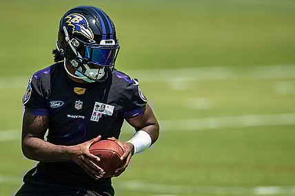 May 26, 2021; Owings Mills, Maryland, USA; Baltimore Ravens quarterback Lamar Jackson (8) in action during an OTA at Under Armour Performance Center. Mandatory Credit: Scott Taetsch-USA TODAY Sports