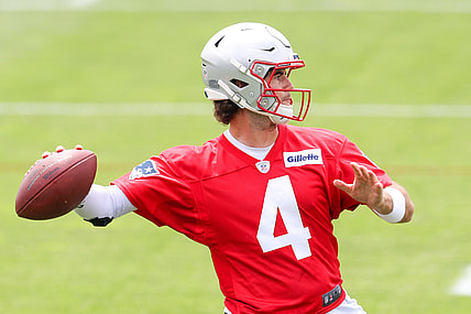 Jun 15, 2021; Foxborough, MA, USA; New England Patriots quarterback Jarrett Stidham (4) participates in a drill during the New England Patriots mini camp at the New England Patriots practice complex. Mandatory Credit: Paul Rutherford-USA TODAY Sports