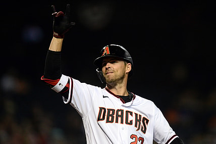 Jul 1, 2021; Phoenix, Arizona, USA; Arizona Diamondbacks right fielder Josh Reddick (22) reacts after hitting a two run home run against the San Francisco Giants during the fourth inning at Chase Field. Mandatory Credit: Joe Camporeale-USA TODAY Sports