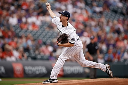 Jul 2, 2021; Denver, Colorado, USA; Colorado Rockies starting pitcher Chi Chi Gonzalez (50) pitches in the first inning against the St. Louis Cardinals at Coors Field. Mandatory Credit: Isaiah J. Downing-USA TODAY Sports