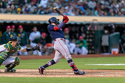 Jul 2, 2021; Oakland, California, USA;  Boston Red Sox left fielder Alex Verdugo (99) hits a RBI single during the fifth inning against the Oakland Athletics at RingCentral Coliseum. Mandatory Credit: Neville E. Guard-USA TODAY Sports