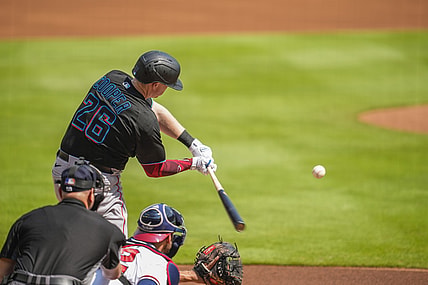 Jul 3, 2021; Cumberland, Georgia, USA; Miami Marlins first baseman Garrett Cooper (26) strikes out against the Atlanta Braves during the first inning at Truist Park. Mandatory Credit: Dale Zanine-USA TODAY Sports