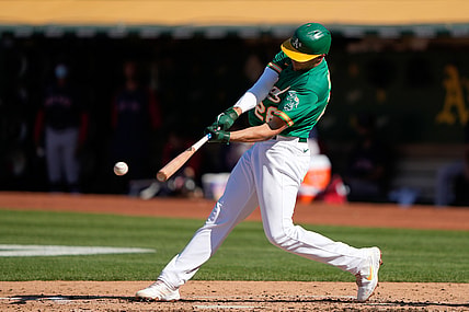 Jul 3, 2021; Oakland, California, USA; Oakland Athletics first baseman Matt Olson (28) hits a single during the third inning against the Boston Red Sox at RingCentral Coliseum. Mandatory Credit: Stan Szeto-USA TODAY Sports
