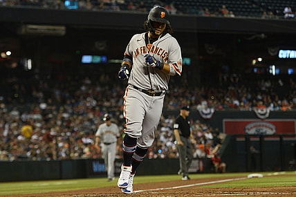 Jul 3, 2021; Phoenix, Arizona, USA; San Francisco Giants shortstop Brandon Crawford (35) scores a run against the Arizona Diamondbacks during the third inning at Chase Field. Mandatory Credit: Joe Camporeale-USA TODAY Sports