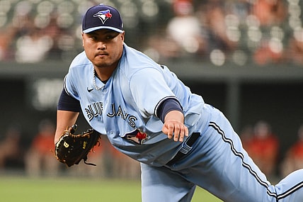 Jul 7, 2021; Baltimore, Maryland, USA;  Toronto Blue Jays starting pitcher Hyun Jin Ryu (99) throws a second inning pitch against the Baltimore Orioles at Oriole Park at Camden Yards. Mandatory Credit: Tommy Gilligan-USA TODAY Sports