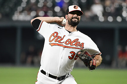 Jul 7, 2021; Baltimore, Maryland, USA; Baltimore Orioles relief pitcher Adam Plutko (35) delivers pitch against the Toronto Blue Jays  at Oriole Park at Camden Yards. Mandatory Credit: Tommy Gilligan-USA TODAY Sports