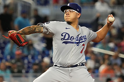 Jul 8, 2021; Miami, Florida, USA; Los Angeles Dodgers starting pitcher Julio Urias (7) delivers a pitch in the 1st inning against the Miami Marlins at loanDepot park. Mandatory Credit: Jasen Vinlove-USA TODAY Sports