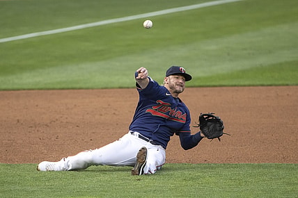 Jul 8, 2021; Minneapolis, Minnesota, USA; Minnesota Twins third baseman Josh Donaldson (20) throws the ball to first base for an out in the fifth inning against the Detroit Tigers at Target Field. Mandatory Credit: Jesse Johnson-USA TODAY Sports