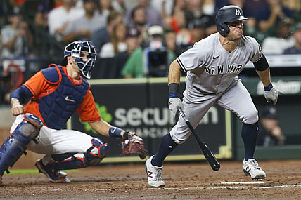 Jul 9, 2021; Houston, Texas, USA; New York Yankees center fielder Brett Gardner (11) hits a two run RBI against the Houston Astros in the fourth inning at Minute Maid Park. Mandatory Credit: Thomas Shea-USA TODAY Sports