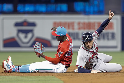 Jul 10, 2021; Miami, Florida, USA; Atlanta Braves first baseman Freddie Freeman (5) reacts from second base during the third inning against Miami Marlins second baseman Jazz Chisholm Jr. (2) at loanDepot Park. Mandatory Credit: Sam Navarro-USA TODAY Sports