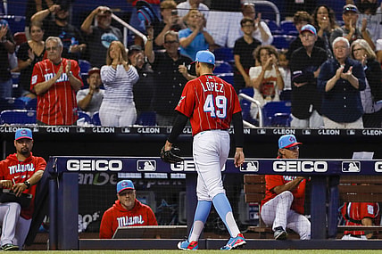 Jul 11, 2021; Miami, Florida, USA; Miami Marlins starting pitcher Pablo Lopez (49) returns to the dugout after the third inning of the game against the Atlanta Braves at loanDepot Park. Mandatory Credit: Sam Navarro-USA TODAY Sports