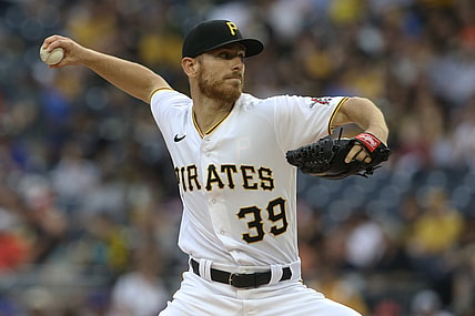 Jul 16, 2021; Pittsburgh, Pennsylvania, USA;  Pittsburgh Pirates starting pitcher Chad Kuhl (39) delivers a pitch against the New York Mets during the first inning at PNC Park. Mandatory Credit: Charles LeClaire-USA TODAY Sports
