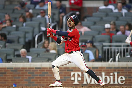 Jul 16, 2021; Atlanta, Georgia, USA; Atlanta Braves second baseman Ozzie Albies (1) has his helmet come off on a swing against the Tampa Bay Rays in the fourth inning at Truist Park. Mandatory Credit: Brett Davis-USA TODAY Sports
