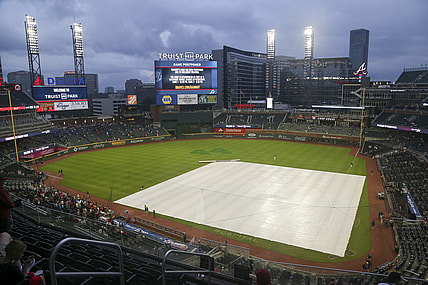 Jul 19, 2021; Atlanta, Georgia, USA; General view of the tarp on the field at Truist Park after a game was canceled between the Atlanta Braves and San Diego Padres due to rain. Mandatory Credit: Brett Davis-USA TODAY Sports