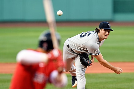 Jul 23, 2021; Boston, Massachusetts, USA; New York Yankees starting pitcher Gerrit Cole (45) pitches against the Boston Red Sox during the first inning at Fenway Park. Mandatory Credit: Brian Fluharty-USA TODAY Sports