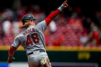 St. Louis Cardinals center fielder Harrison Bader (48) points after hitting a 3-run home run in the fourth inning of the MLB baseball game between the Cincinnati Reds and the St. Louis Cardinals on Sunday, July 25, 2021, at Great American Ball Park in Cincinnati.

Cincinnati Reds St Louis Cardinals