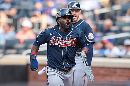 Jul 26, 2021; New York City, New York, USA; Atlanta Braves center fielder Guillermo Heredia (38) reacts after scoring a run against the New York Mets during the third inning at Citi Field. Mandatory Credit: Vincent Carchietta-USA TODAY Sports