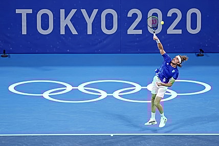 Jul 27, 2021; Tokyo, Japan; Stefanos Tsitsipas (GRE) plays Frances Tiafoe (USA) in the mens tennis first round singles during the Tokyo 2020 Olympic Summer Games at Ariake Tennis Park. Mandatory Credit: Yukihito Taguchi-USA TODAY Sports