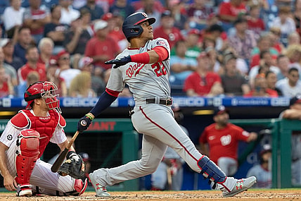 Jul 27, 2021; Philadelphia, Pennsylvania, USA; Washington Nationals left fielder Juan Soto (22) hits a three RBI home run against the Philadelphia Phillies during the second inning at Citizens Bank Park. Mandatory Credit: Bill Streicher-USA TODAY Sports