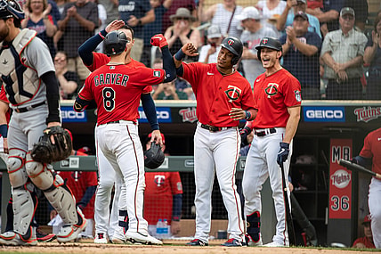 Jul 27, 2021; Minneapolis, Minnesota, USA; Minnesota Twins catcher Mitch Garver (8) celebrates with second baseman Jorge Polanco (11) after hitting a grand slam against the Detroit Tigers during the first inning at Target Field. Mandatory Credit: Jordan Johnson-USA TODAY Sports