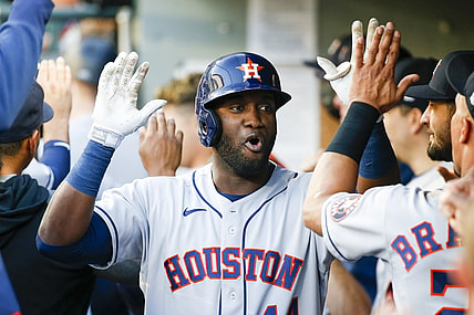 Jul 27, 2021; Seattle, Washington, USA; Houston Astros left fielder Yordan Alvarez (44) exchanges high fives in the dugout after hitting a three-run home run against the Seattle Mariners during the first inning at T-Mobile Park. Mandatory Credit: Joe Nicholson-USA TODAY Sports
