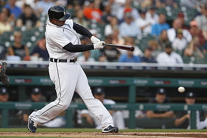 Jul 29, 2021; Detroit, Michigan, USA; Detroit Tigers designated hitter Jonathan Schoop (7) hits a RBI single during the first inning against the Baltimore Orioles at Comerica Park. Mandatory Credit: Raj Mehta-USA TODAY Sports