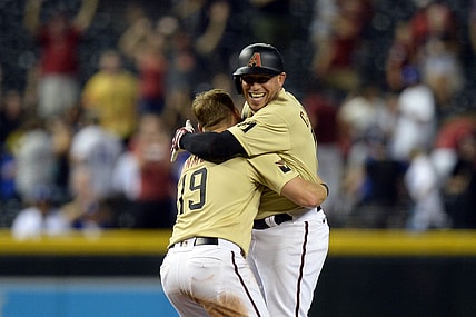 Jul 30, 2021; Phoenix, Arizona, USA; Arizona Diamondbacks third baseman Asdrubal Cabrera (14) celebrates after a walk off RBI single against the Los Angeles Dodgers during the tenth inning at Chase Field. Mandatory Credit: Joe Camporeale-USA TODAY Sports