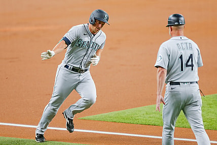 Jul 31, 2021; Arlington, Texas, USA; Seattle Mariners third baseman Kyle Seager (15) runs the bases after hitting a home run against the Texas Rangers during the first inning at Globe Life Field. Mandatory Credit: Andrew Dieb-USA TODAY Sports