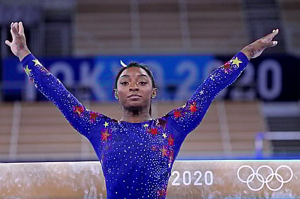 Simone Biles out of Team USA gymnastics final, coach cites 'mental issue' as reason