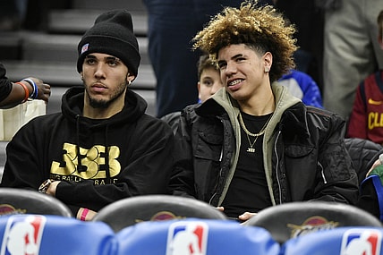 Dec 14, 2017; Cleveland, OH, USA; LiAngelo Ball, left, and LaMelo Ball sit behind the Los Angeles Lakers bench before a game between the Cleveland Cavaliers and the Los Angeles Lakers at Quicken Loans Arena. Mandatory Credit: David Richard-USA TODAY Sports