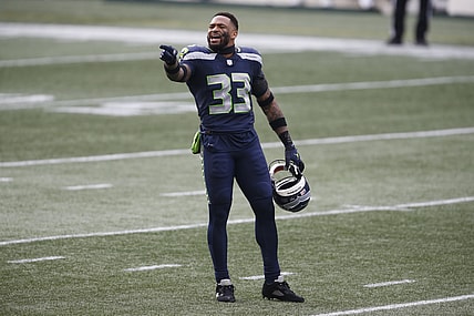 Jan 9, 2021; Seattle, Washington, USA; Seattle Seahawks safety Jamal Adams (33) yells to the sidelines during the first quarter against the Los Angeles Rams at Lumen Field. Mandatory Credit: Joe Nicholson-USA TODAY Sports
