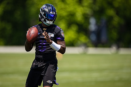 May 26, 2021; Owings Mills, Maryland, USA; Baltimore Ravens quarterback Lamar Jackson (8) in action during an OTA at Under Armour Performance Center. Mandatory Credit: Scott Taetsch-USA TODAY Sports