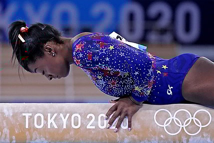 Jul 25, 2021; Tokyo, Japan; Simone Biles (USA) competes on the balance beam in the womens gymnastics qualifications during the Tokyo 2020 Olympic Summer Games at Ariake Gymnastics Centre. Mandatory Credit: Robert Deutsch-USA TODAY Network
