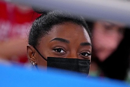 Jul 29, 2021; Tokyo, Japan; Simone Biles looks on in the women's gymnastics individual all-around final during the Tokyo 2020 Olympic Summer Games at Ariake Gymnastics Centre. Mandatory Credit: Robert Deutsch-USA TODAY Sports