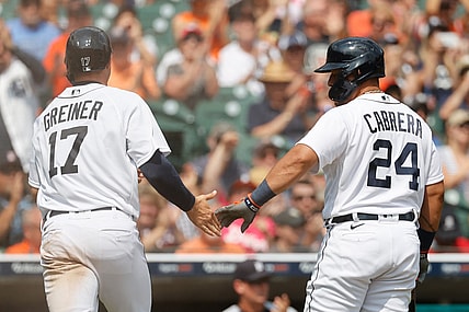 Aug 1, 2021; Detroit, Michigan, USA; Detroit Tigers catcher Grayson Greiner (17) receives congratulations from designated hitter Miguel Cabrera (24) after scoring in the seventh inning against the Baltimore Orioles at Comerica Park. Mandatory Credit: Rick Osentoski-USA TODAY Sports