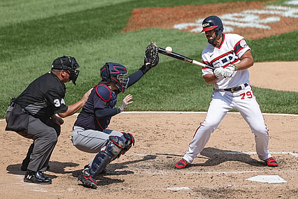 Aug 1, 2021; Chicago, Illinois, USA; Chicago White Sox first baseman Jose Abreu (79) is hit by a pitch from Cleveland Indians starting pitcher Cal Quantrill (not pictured) during the fifth inning at Guaranteed Rate Field. Mandatory Credit: Kamil Krzaczynski-USA TODAY Sports