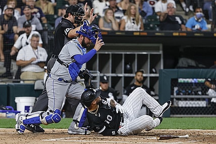 Aug 5, 2021; Chicago, Illinois, USA; Chicago White Sox third baseman Yoan Moncada (10) is hit by a pitch from Kansas City Royals starting pitcher Daniel Lynch (not pictured) during the fourth inning at Guaranteed Rate Field. Mandatory Credit: Kamil Krzaczynski-USA TODAY Sports