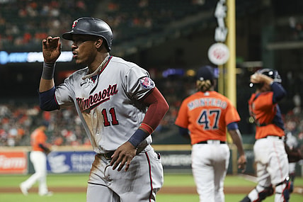 Aug 6, 2021; Houston, Texas, USA;Minnesota Twins designated hitter Jorge Polanco (11) scores a run against the Houston Astros in the eleventh inning at Minute Maid Park. Mandatory Credit: Thomas Shea-USA TODAY Sports