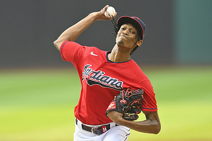 Aug 10, 2021; Cleveland, Ohio, USA; Cleveland Indians starting pitcher Triston McKenzie (24) delivers a pitch in the first inning against the Oakland Athletics at Progressive Field. Mandatory Credit: David Richard-USA TODAY Sports
