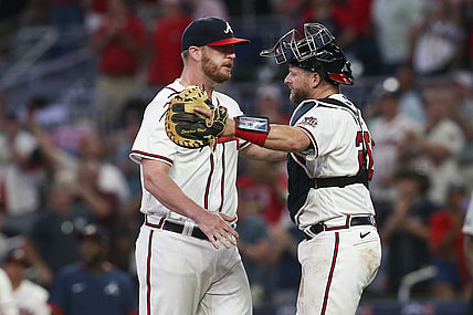 Aug 10, 2021; Atlanta, Georgia, USA; Atlanta Braves relief pitcher Will Smith (51) and catcher Stephen Vogt (26) celebrate after defeating the Cincinnati Reds at Truist Park. Mandatory Credit: Brett Davis-USA TODAY Sports